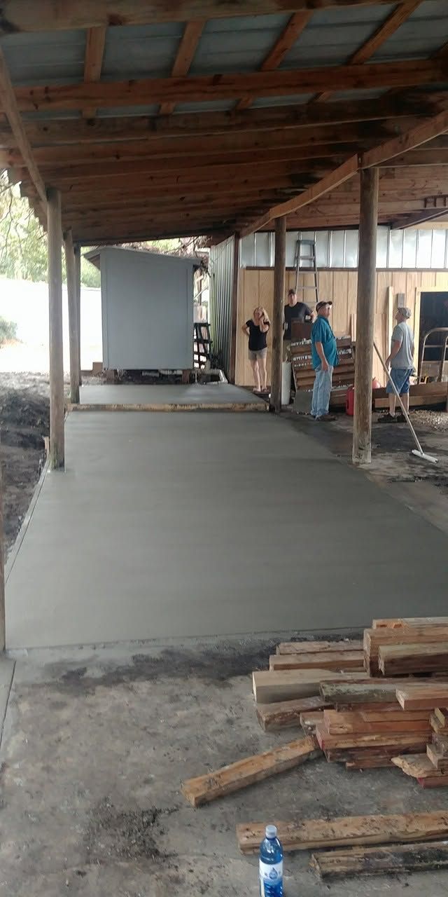 Concrete walkway under a covered porch