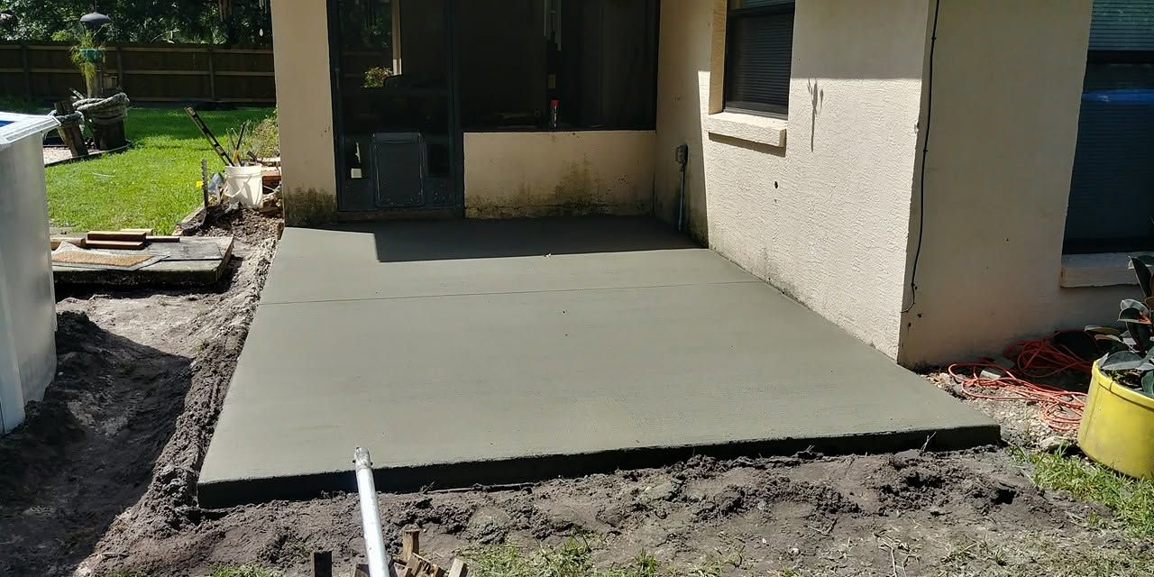 Front patio slab at a stucco home