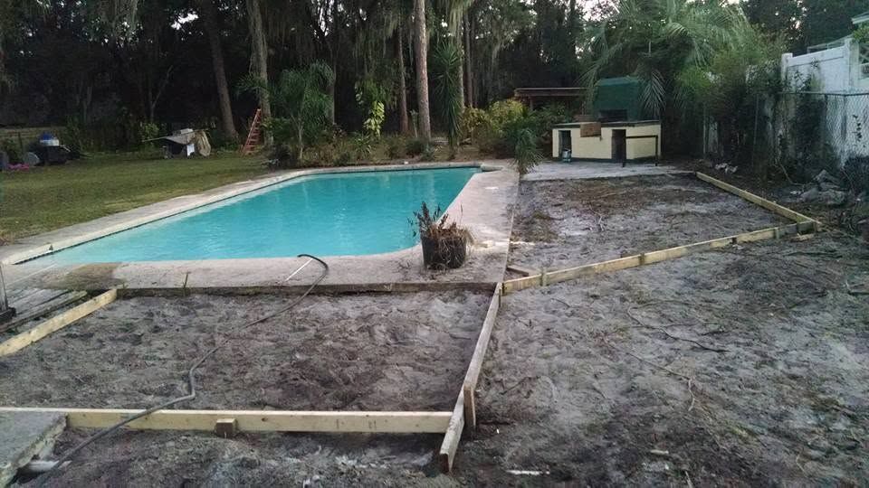 Forms set around a pool for a new deck